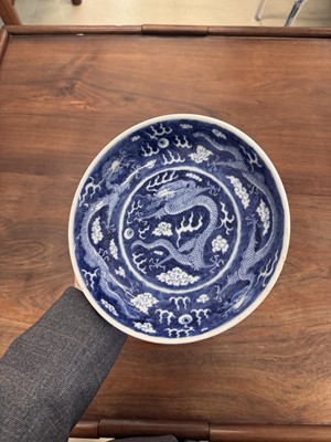 Lot 62 - A Chinese blue and white 'dragon' dish, Qing dynasty, Guangxu mark and of the period