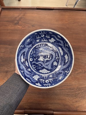 Lot 62 - A Chinese blue and white 'dragon' dish, Qing dynasty, Guangxu mark and of the period