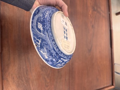Lot 62 - A Chinese blue and white 'dragon' dish, Qing dynasty, Guangxu mark and of the period