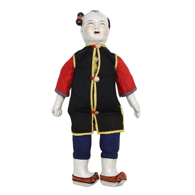 Lot 574 - A Chinese ceramic doll, Republic period