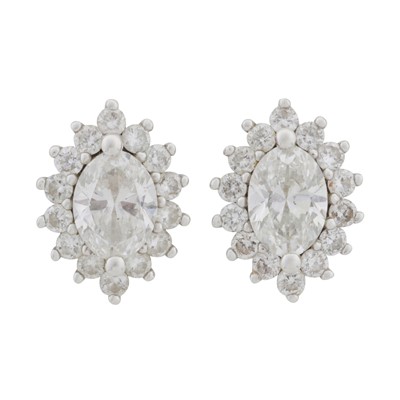 Lot 324 - A pair of diamond stud earrings