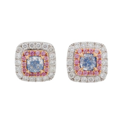 Lot 291 - A pair of coloured diamond stud earrings