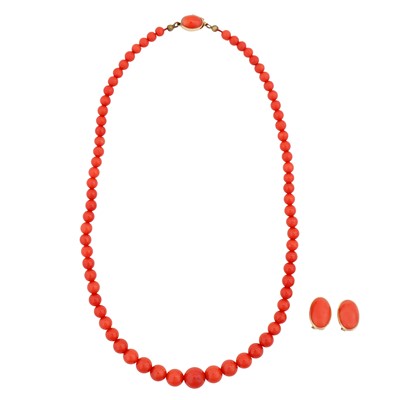 Lot 94 - λ A single strand coral necklace together with a pair of coral studs