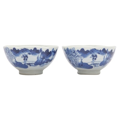 Lot 607 - Two Chinese blue and white 'landscape' scalloped cups, Qing dynasty, 18th/19th century