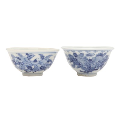 Lot 622 - Two small Chinese blue and white 'floral' cups, Qing dynasty, Guangxu period