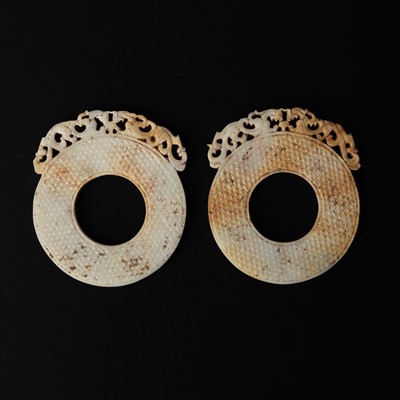 Lot 116 - Two Chinese archaistic jade 'chilong' bi discs, Han dynasty or later