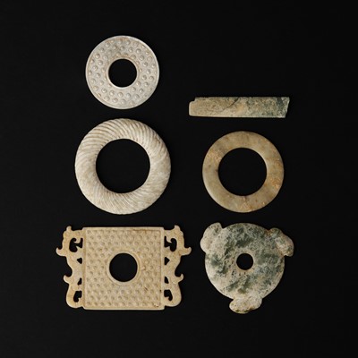 Lot 117 - Six Chinese archaistic jade plaques, 19th/20th century or earlier