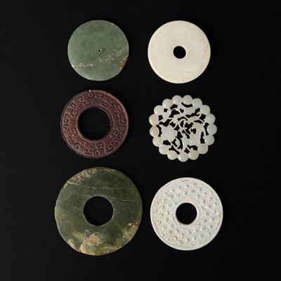 Lot 119 - Six Chinese jade archaistic jade bi discs and plaques, 18th/19th century or earlier