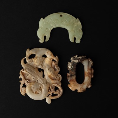 Lot 122 - Three Chinese archaistic jade pendants, 19th/20th century or earlier
