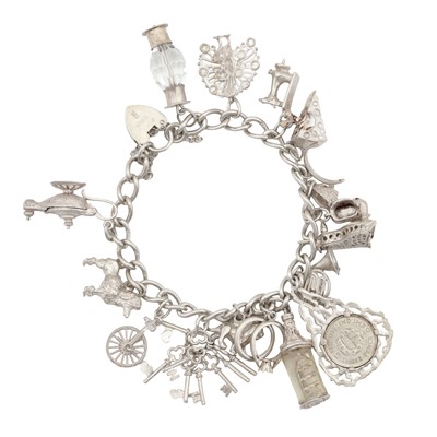 Lot 117 - A heart lock charm bracelet