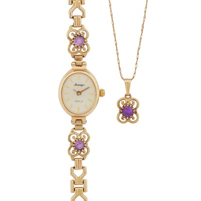 Lot 102 - An amethyst watch and a matching pendant necklace