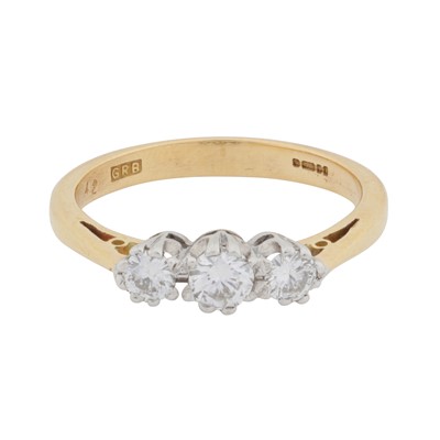 Lot 443 - A three-stone brilliant cut diamond ring, circa 1995