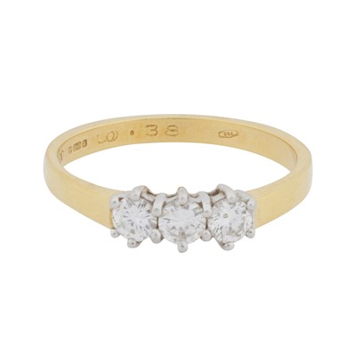 Lot 439 - A three-stone diamond ring, circa 1994