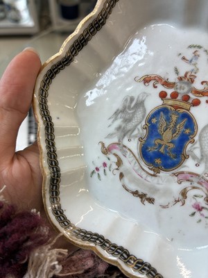 Lot 549 - A Chinese armorial saucer and a 'European subject' saucer, Qing dynasty, 18th century