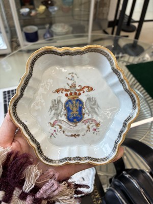 Lot 549 - A Chinese armorial saucer and a 'European subject' saucer, Qing dynasty, 18th century