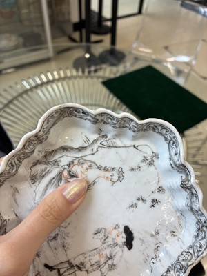 Lot 549 - A Chinese armorial saucer and a 'European subject' saucer, Qing dynasty, 18th century