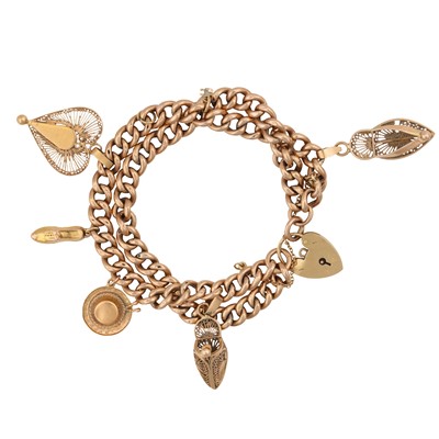 Lot 163 - A double curb-link charm bracelet