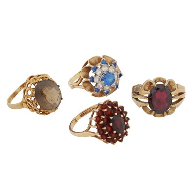 Lot 243 - Four gem set rings