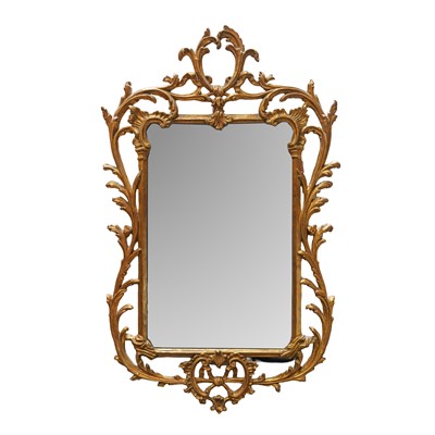 Lot 70 - A Florentine rococo style carved giltwood wall mirror