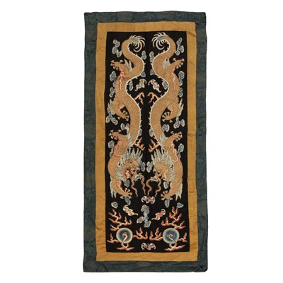 Lot 387 - A Chinese silk 'double-dragon' embroidered panel, Qing dynasty