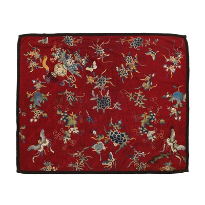 Lot 384 - A Chinese silk 'floral' embroidered burgundy panel, 19th century