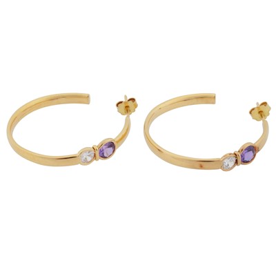 Lot 334 - A pair of gem-set hoop earrings