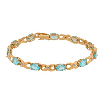 Lot 135 - A topaz and diamond bracelet