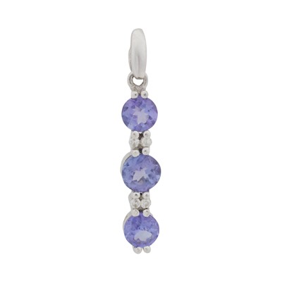 Lot 54 - A tanzanite and white sapphire pendant
