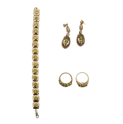 Lot 199 - A peridot bracelet, pendent earrings and rings set