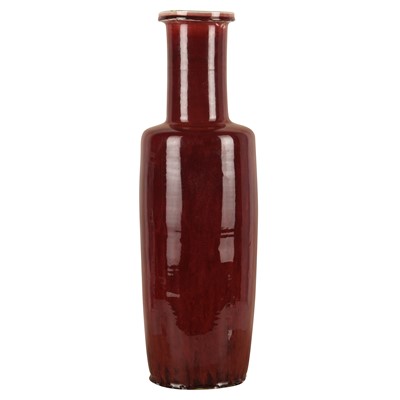 Lot 37 - A rare and very large Chinese copper red-glazed 'Langyao' rouleau vase, Qing dynasty, Kangxi period