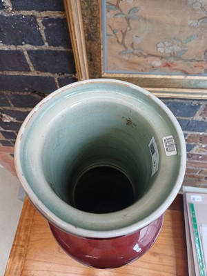 Lot 37 - A rare and very large Chinese copper red-glazed 'Langyao' rouleau vase, Qing dynasty, Kangxi period