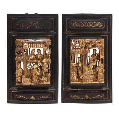 Lot 585 - Two Chinese carved and gilt-decorated 'figural' wood panels, Qing dynasty, 19th century