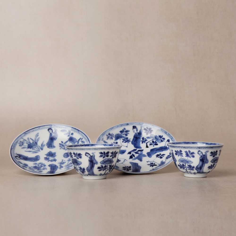 Lot 9 - A pair of fine Chinese export eggshell 'lady' cups and saucers, Qing dynasty, Kangxi period