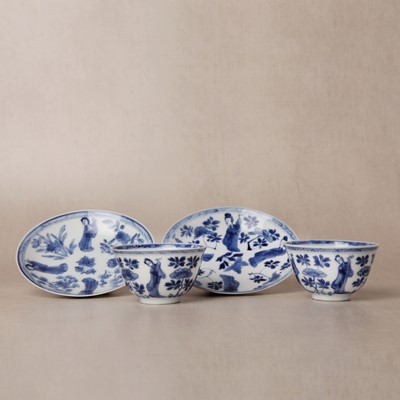 Lot 9 - A pair of fine Chinese export eggshell 'lady' cups and saucers, Qing dynasty, Kangxi period