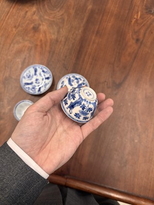 Lot 9 - A pair of fine Chinese export eggshell 'lady' cups and saucers, Qing dynasty, Kangxi period