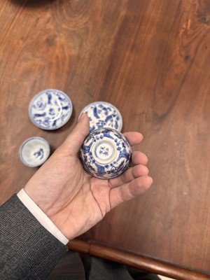 Lot 9 - A pair of fine Chinese export eggshell 'lady' cups and saucers, Qing dynasty, Kangxi period