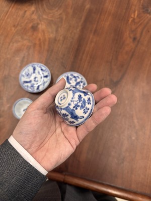 Lot 9 - A pair of fine Chinese export eggshell 'lady' cups and saucers, Qing dynasty, Kangxi period