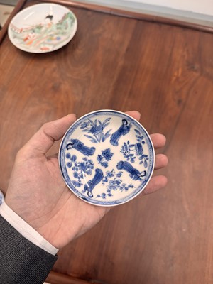 Lot 9 - A pair of fine Chinese export eggshell 'lady' cups and saucers, Qing dynasty, Kangxi period