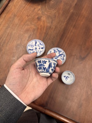 Lot 9 - A pair of fine Chinese export eggshell 'lady' cups and saucers, Qing dynasty, Kangxi period