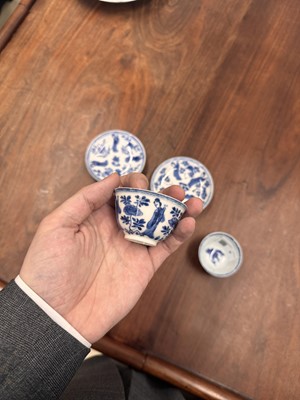 Lot 9 - A pair of fine Chinese export eggshell 'lady' cups and saucers, Qing dynasty, Kangxi period