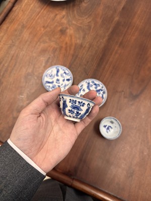 Lot 9 - A pair of fine Chinese export eggshell 'lady' cups and saucers, Qing dynasty, Kangxi period
