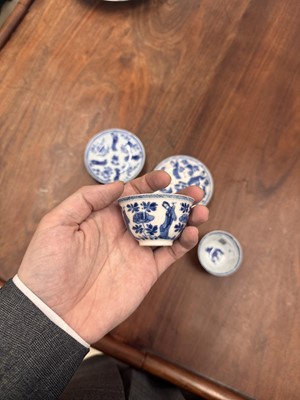 Lot 9 - A pair of fine Chinese export eggshell 'lady' cups and saucers, Qing dynasty, Kangxi period