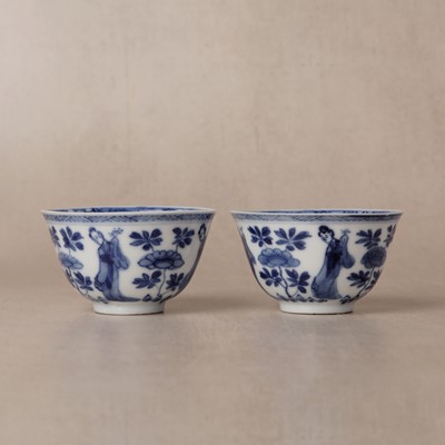 Lot 9 - A pair of fine Chinese export eggshell 'lady' cups and saucers, Qing dynasty, Kangxi period