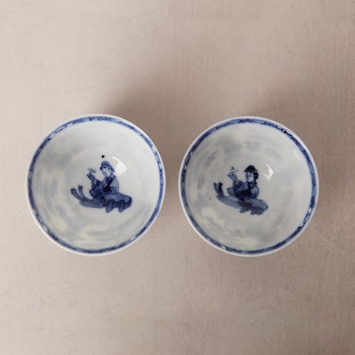 Lot 9 - A pair of fine Chinese export eggshell 'lady' cups and saucers, Qing dynasty, Kangxi period