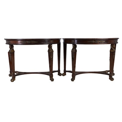 Lot 244 - A pair of Empire style mahogany demi lune console tables