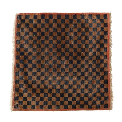 Lot 590 - A Tibetan 'checkerboard' square rug, 19th/20th century