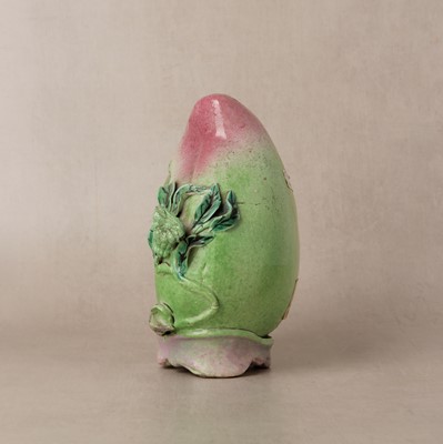 Lot 49 - A Chinese famille-rose 'shoulao' peach figure, Qing dynasty, 19th century