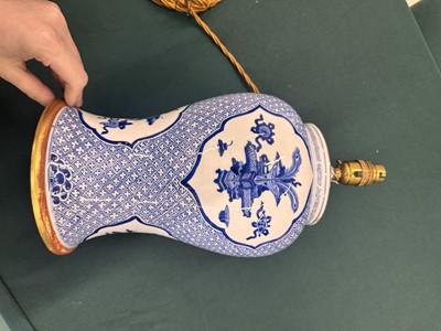 Lot 5 - A Chinese blue and white 'precious objects' vase, Qing dynasty, Kangxi period
