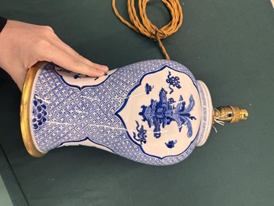Lot 5 - A Chinese blue and white 'precious objects' vase, Qing dynasty, Kangxi period