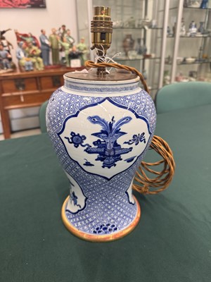 Lot 5 - A Chinese blue and white 'precious objects' vase, Qing dynasty, Kangxi period